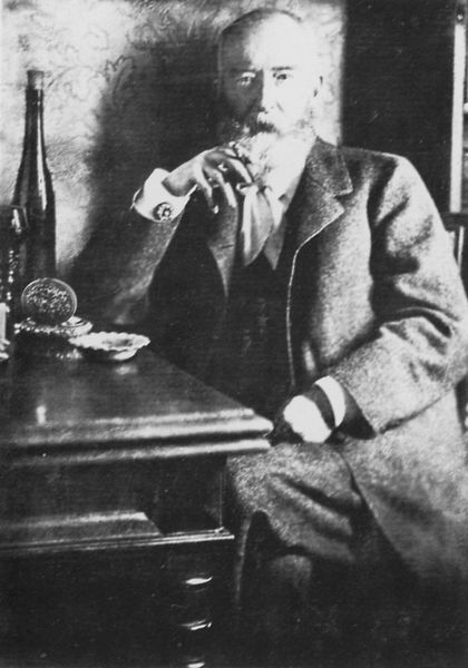 Wilhelm Busch in der Attitüde des stillen Genießers