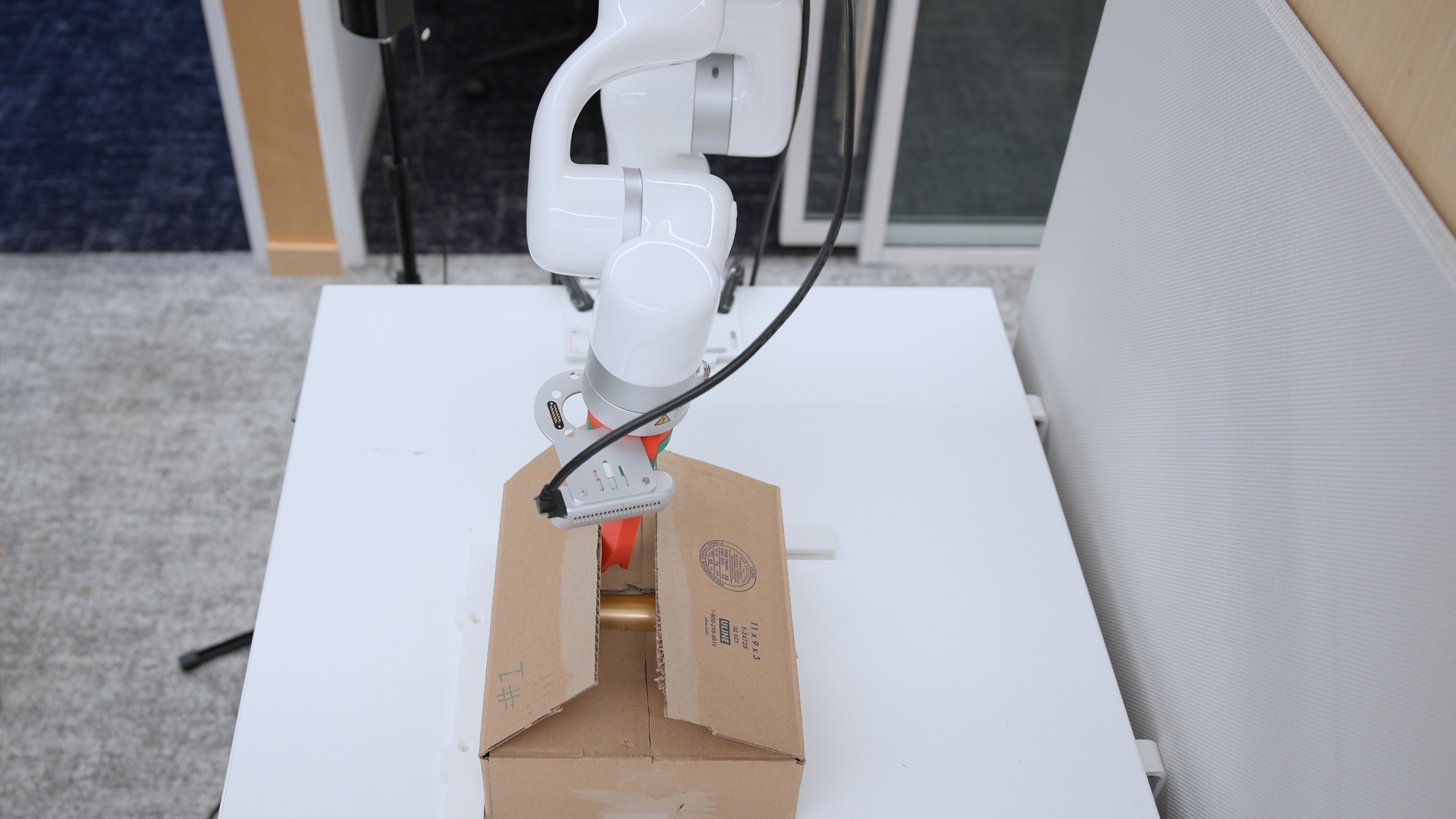 Viam Debuts Box Opening Robot at IROS 2026