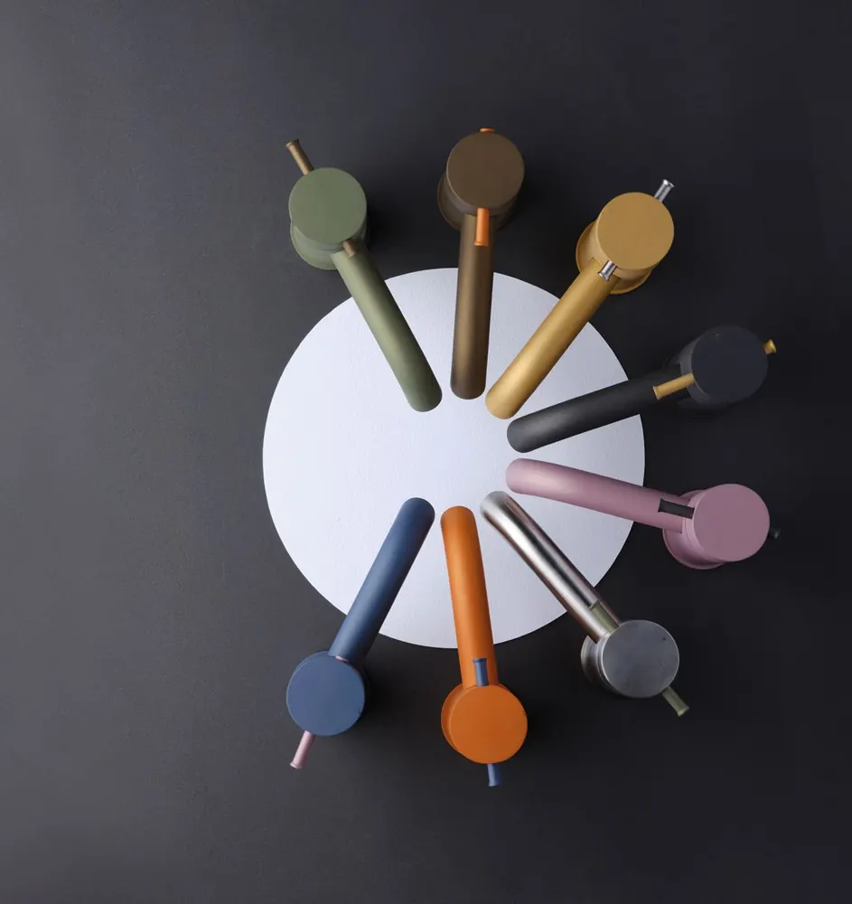 The seven Fontea Tinta coloured tap levers arranged in a circle