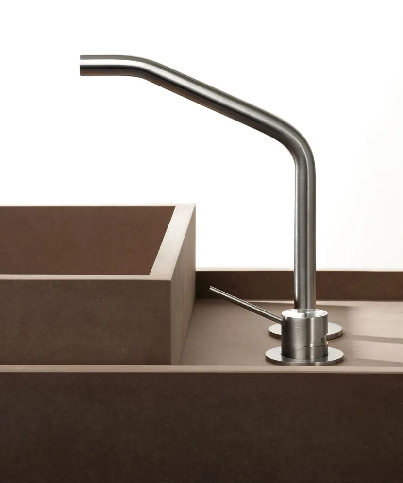 A tall Fontea brushed stainless steel kitchen tap over a stone worktop
