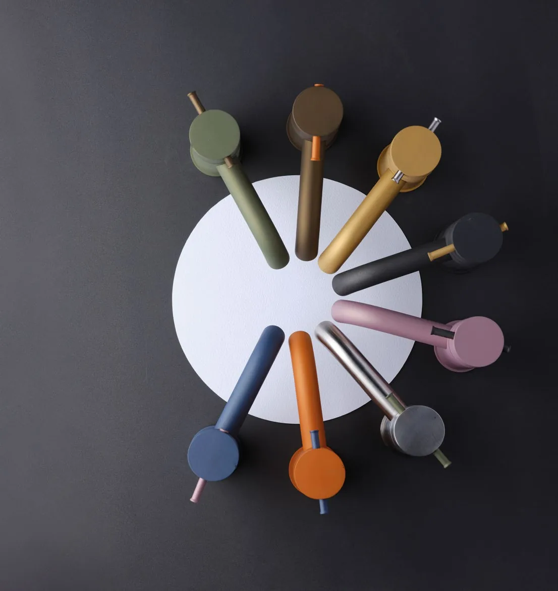 The seven Fontea Tinta coloured tap levers arranged in a circle
