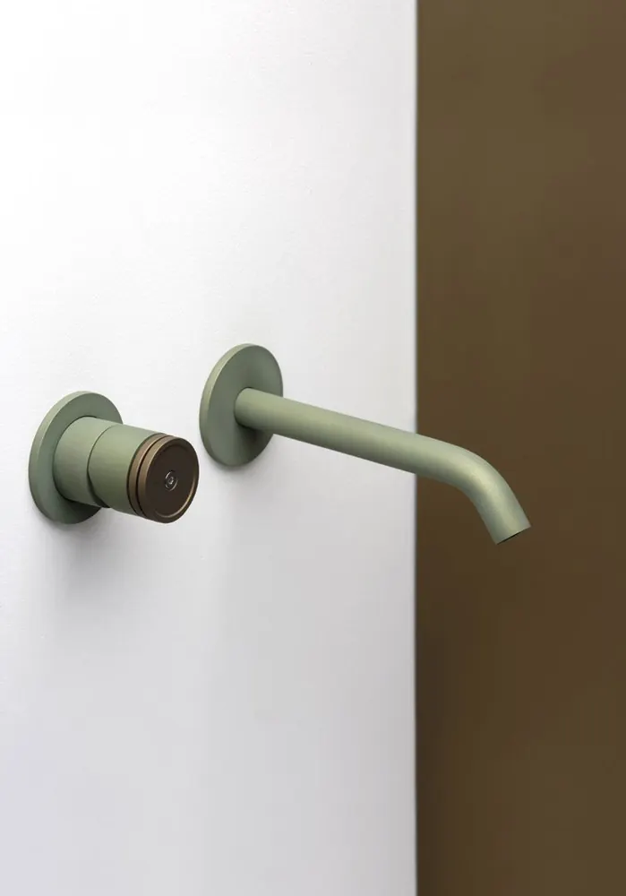 Fontea wall-mounted tap in calm green on a green backdrop